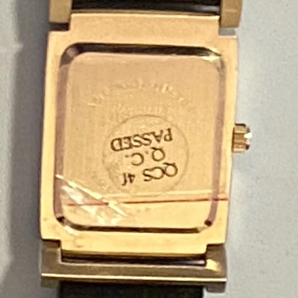 Embassy by Gruen Quartz Gold Tone Rectangular Watch Black Leather Band